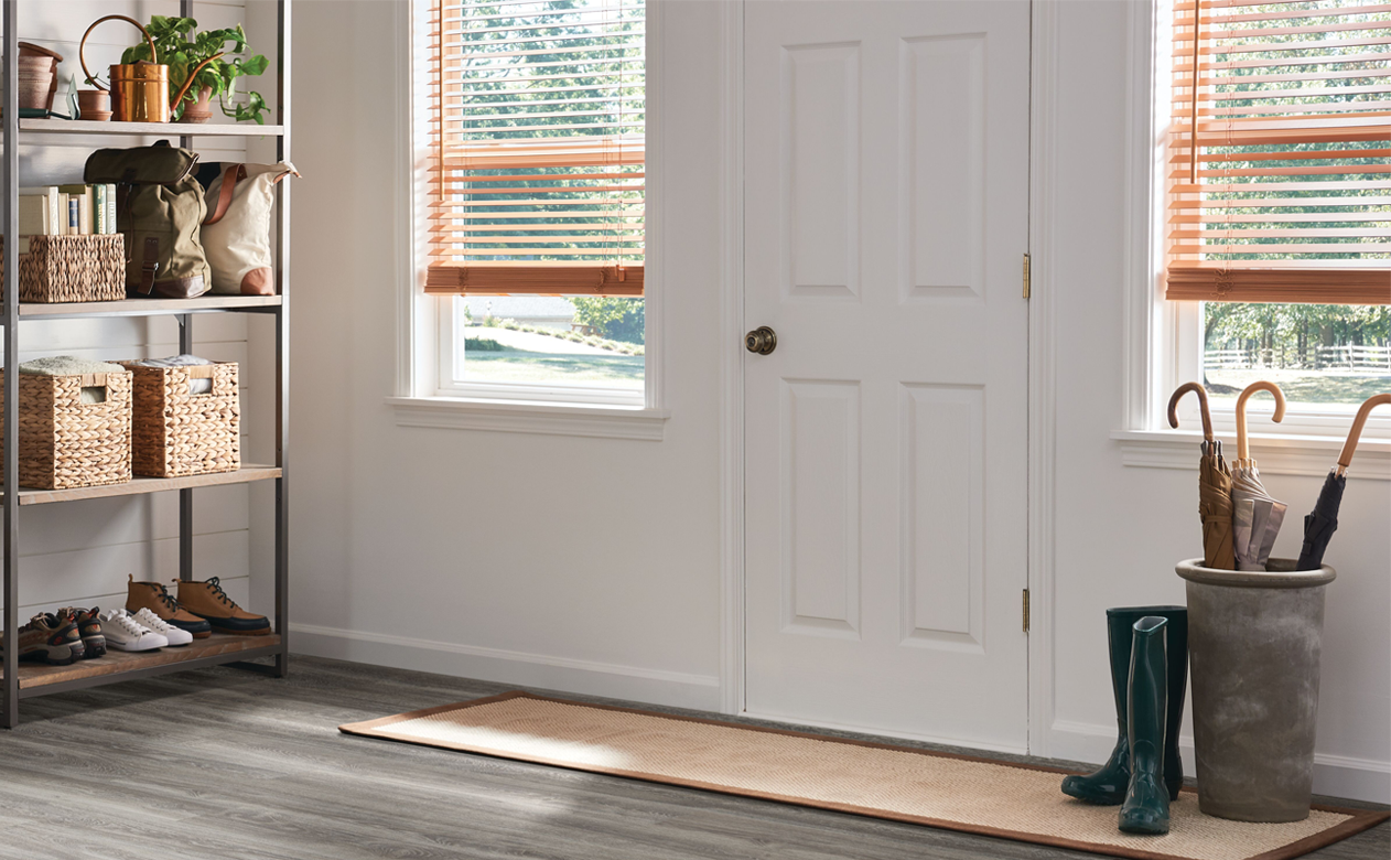 wood look blinds in entryway